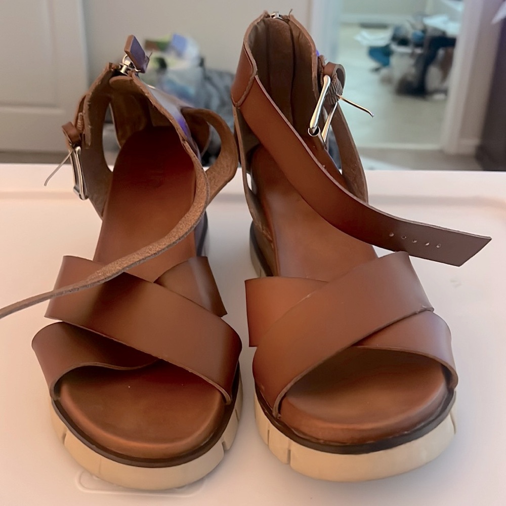 Mia size 8.5 wedge Sandler. Gently used, brown faux leather, zips in the back.